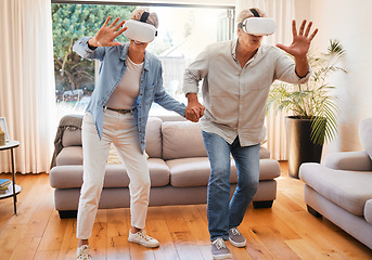 Image showing Metaverse, vr headset and senior couple in fun 3d play game in lockdown house or home living room. Virtual reality, cyber esports and digital gaming for retirement elderly man and woman holding hands