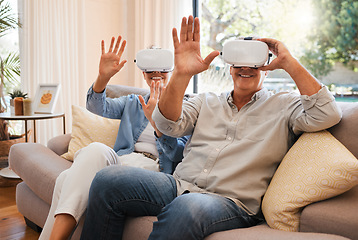 Image showing Gaming, vr and senior couple on a sofa, virtual reality and fun in a living room. Metaverse, fantasy and retirement by elderly man and woman enjoying playful, creative and virtual game in their home