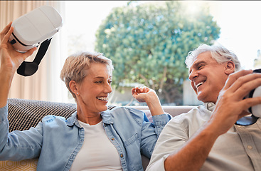 Image showing VR, 3d gaming and senior couple talking about technology on the living room sofa in house. Happy elderly man and woman with smile for digital game on metaverse tech during retirement in their home