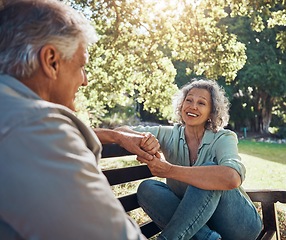 Image showing Retirement, relax and love with couple in park together for peace, happy and nature in spring. Wellness, smile and marriage with old man and woman on bench in countryside for nature, summer and date