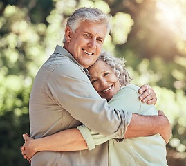 Image showing Hug, nature park and senior couple on love date and travel holiday in Canada together in summer. Portrait of elderly man and woman hugging with smile in garden with bokeh background on vacation