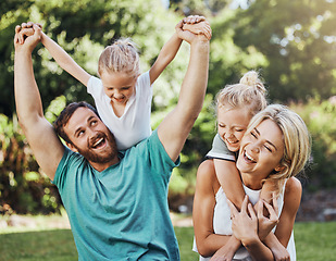 Image showing Love, happy and family playing in a park, laugh and relax while having fun together. Freedom, kids and caring parents embracing and enjoying quality time with fun game outdoors, cheerful and positive