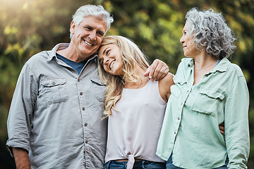 Image showing Nature, senior parents and hug with daughter to bond on weekend in usa for happy family moment. Proud, elderly and retirement people with woman relatives smile together with care and love embrace.