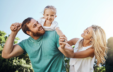 Image showing Kids, summer and family with a girl, mother and father in the park or nature for adventure and fun. Children, parents and love with a man, woman and daughter outdoor while on vacation or holiday