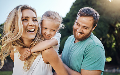 Image showing Love, happy family and summer nature with child bonding together with young parents in the usa. Piggyback ride with american mother and father enjoying leisure break with cute daughter in park.