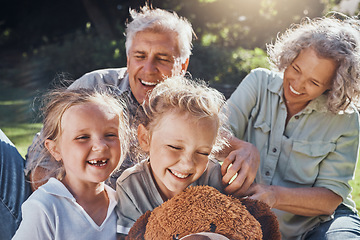 Image showing Family, children and love with a girl, grandparents and sister outdoor in a nature park for fun and adventure. Kids, park and picnic with an elderly male, female and grandchildren laughing outside