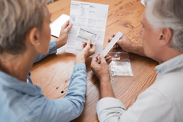 Image showing Old couple, documents and pcr covid test, health and testing for corona virus diagnosis at home. Covid 19, healthcare and senior, retired man and woman with medical kit for self screening in pandemic