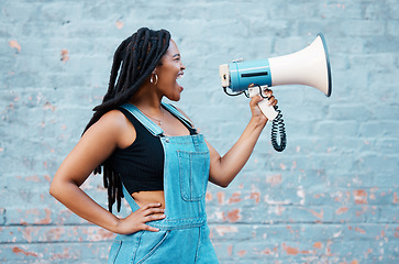 Image showing Megaphone, protest and black woman with speech, rally and announcement for politics, equality and human rights. Feminist, revolution and loud communication with voice shouting for justice and freedom