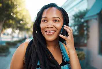 Image showing Happy black woman on the street, phone call on smartphone and talking on the pavement outside in the city. Smiling african american student, 5g mobile communication and connection for road directions