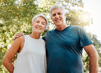 Image showing Old couple, hug and nature portrait smile outdoors, park or outside on break after running, walk or exercise. Health, workout and elderly man and woman, walking or spend quality fitness time together