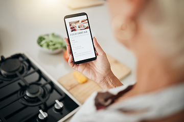 Image showing Recipe, cooking and healthy food list on a phone screen with a woman to cook in a kitchen home. Nutritionist person ready to start health, nutrition and vegetables for a meal using mobile technology