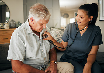 Image showing Healthcare, senior man and woman nurse with stethoscope checking heart rate at retirement home. Health, care and elderly grandpa on living room sofa with lady caregiver on medical visit or house call