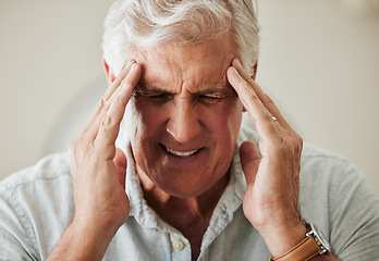 Image showing Senior man, suffering with headache pain from stress and painful head migraine. Elderly people at risk for mental health problems like anxiety and depression or loneliness from old age in retirement