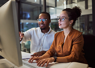 Image showing Night training, teamwork and employees planning marketing strategy in a dark office on computer at work. Corporate African man and woman talking about business collaboration during overtime together