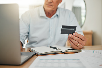 Image showing Credit card, online shopping senior man or banking with laptop, internet or web for audit, bills or tax payment at home. Elderly with ecommerce for shopping, trading or retirement investment planning