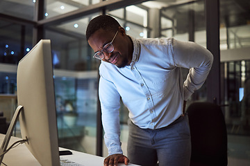 Image showing Stress at night, tired employee with back pain working at night and risk of burnout or quitting. Career dedication, marketing professional with deadline and motivation to complete project for success