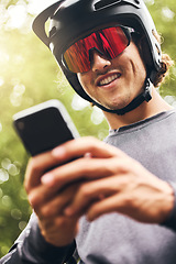 Image showing Adventure, sports man with smartphone in forest check GPS location, fitness goal or progress on mobile app. Athletic in nature reading online results, web for triathlon tips on 5g network mobile app