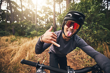 Image showing Mountain bike, cycling and fitness with a man gesture a shaka hand sign while training or exercise in Brazil nature. Portrait of a professional male sports athlete doing cardio ednurance in a forest