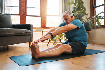 Image showing Health, exercise and yoga with senior man doing ground stretching before meditation and wellness workout. Fitness, relax and floor warm up by elderly male start healthy cardio training in living room