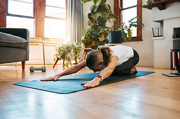 Image showing Exercise, fitness and yoga stretching for health, wellness and healthy body, mind and spirit on living room floor. Calm woman start with pilates, workout and training with balance and meditation