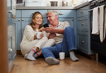 Image showing Senior couple, phone or bonding with morning coffee on house or home hotel kitchen floor in trust, love or security. Smile, happy or technology for retirement elderly man and woman with internet news