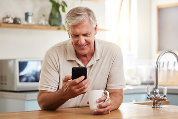 Image showing Mature man reading phone, social media notification and mobile app news in New Zealand kitchen home. Happy male drinking coffee, typing online smartphone and 5g wifi technology connection in house