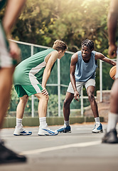 Image showing Men play basketball, team training exercise and sports match. Outdoor basketball court for a group exercise, fitness and workout for competition win. Teamwork, motivation and energy for sport success