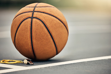 Image showing Basketball, sport and whistle with a ball on a court outside for fitness, exercise or sports training. Workout, health and game with no one at an empty venue for cardio and health lifestyle