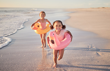 Image showing Girls running, kids and beach holiday, vacation or summer trip in Mexico. Travel, portrait and children on sandy ocean sea shore having fun, excited and happy smile together trying to catch waves.