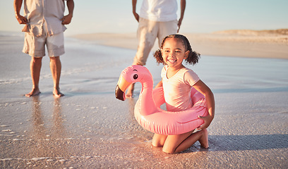 Image showing Beach, flamingo and child portrait on family holiday in Mexico enjoying summer break. Young, happy and excited girl relaxing on ocean holiday sand for leisure fun with cheerful smile.