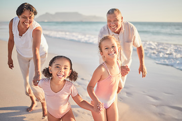 Image showing Girl, kids and happy grandparents at beach, on holiday or vacation together. Grandma, children and grandpa play by ocean, smile on family travel in summer on walk by sea in Cape Town, South Africa