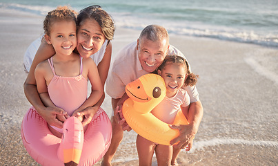 Image showing Family, beach and portrait of grandparents with multiracial kids bond on Mexico holiday in summer. Retirement grandma and grandpa enjoy caring hug with foster and adoption grandchildren in water.