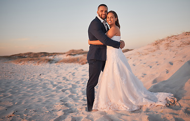 Image showing Wedding, couple and bride with groom at a beach in Cancun, Mexico in celebration of love, trust and marriage. Smile, romance and happy woman hugging her partner enjoying a special day and commitment