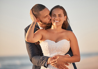 Image showing Love, wedding and couple on beach together hug and bonding while celebrating their marriage in nature. Portrait, bride and groom embrace on ocean trip in Brazil, just married happy and relax by sea