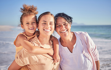 Image showing Girl, mother and grandmother portrait on the beach during travel holiday in Spain in summer together. Child, mom and senior person in retirement with happy smile on vacation with family by the sea