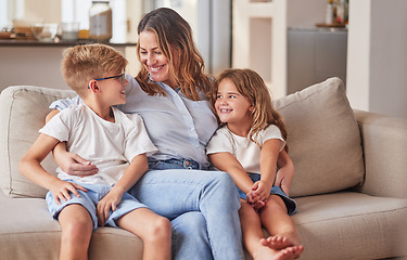 Image showing Happy kids, mom and mothers day in living room sofa, love and relaxing together in Australia family home. Young children, smile parent and happiness, quality time and care on lounge couch for fun