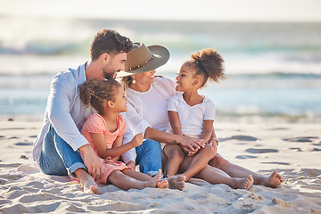 Image showing Parents, kids and beach sand vacation, family holiday and summer sea travel together in Portugal. Smile mom, love dad and happy young girl children, relax and quality time in sunshine ocean outdoors