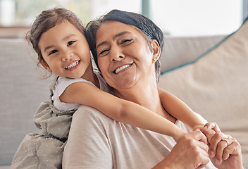 Image showing Girl, grandma and sofa smile for love in bonding time together in home on holiday. Grandmother, kid and living room care, happiness and time as family in happy moment on couch in living room