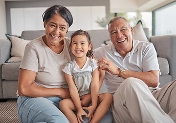 Image showing Grandparents, girl and floor in house, smile and playing while in bonding together. Grandmother, grandpa and child on carpet in living room, smile and family home, for visit or holiday in Jakarta