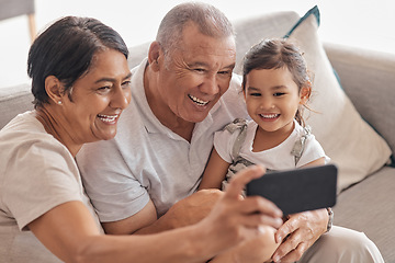 Image showing Family, grandparents and selfie on smartphone with child happy and excited to bond with relatives. Phone photograph for senior grandmother and grandpa babysitting grandchild in Mexico home.