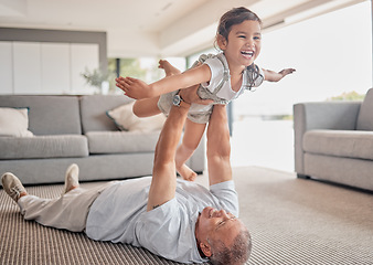 Image showing Love, happy grandfather and girl play in living room and laugh, fun and smile together. Grandparent lifting grandchild at home in lounge and enjoy bonding, carefree and relax on floor on weekend.