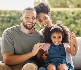 Image showing Family, children and love with a girl, mother and father outside in the summer sunshine to relax in the garden together. Kids, parents and affection with a man, woman and daughter in the backyard