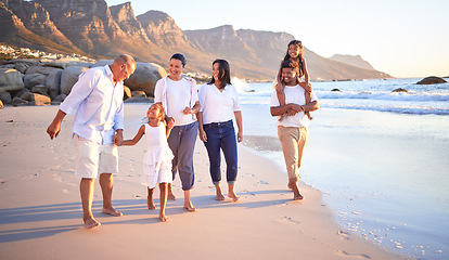 Image showing Family walk, beach travel and children walking by sea on holiday in Maldives with happy grandparents and parents. Elderly people, mother and father with smile on nature vacation with girl siblings