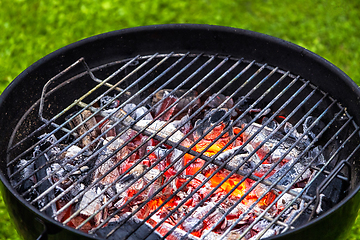 Image showing burning charcoal grill