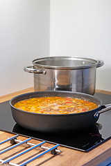 Image showing pan and pot on electric stove