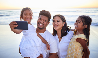 Image showing Family selfie, happy beach and parents on ocean holiday with children in Cancun and smile for international vacation by the sea. Girl siblings taking photo on phone with mother and father in nature