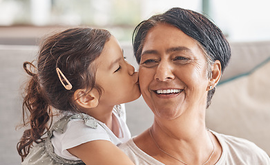 Image showing Love, family and kiss with girl and grandma together for happy, retirement or mothers day celebration. Smile, hug and proud with child and grandmother at home in embrace for birthday or care