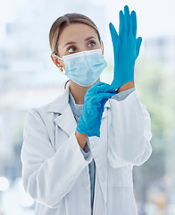 Image showing Doctor mask, covid gloves and woman ready for operation, surgery or examination. Health, healthcare and medical female professional safety ppe, corona virus or bacteria, germs and disease prevention