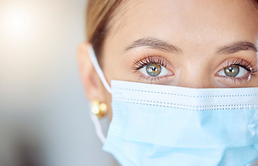 Image showing Health, wellness and covid face mask of a young woman safety and head. Eye zoom of a female with nose and mouth cover for prevention and protection from coronavirus, flu and cold in a pandemic