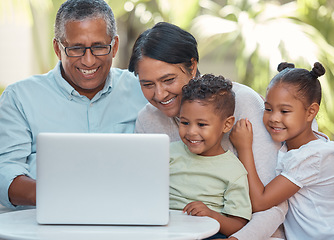 Image showing Grandparents, children and laptop on video call with family in house garden or home backyard. Smile, happy and kids with senior man and woman bonding with communication technology for movie streaming